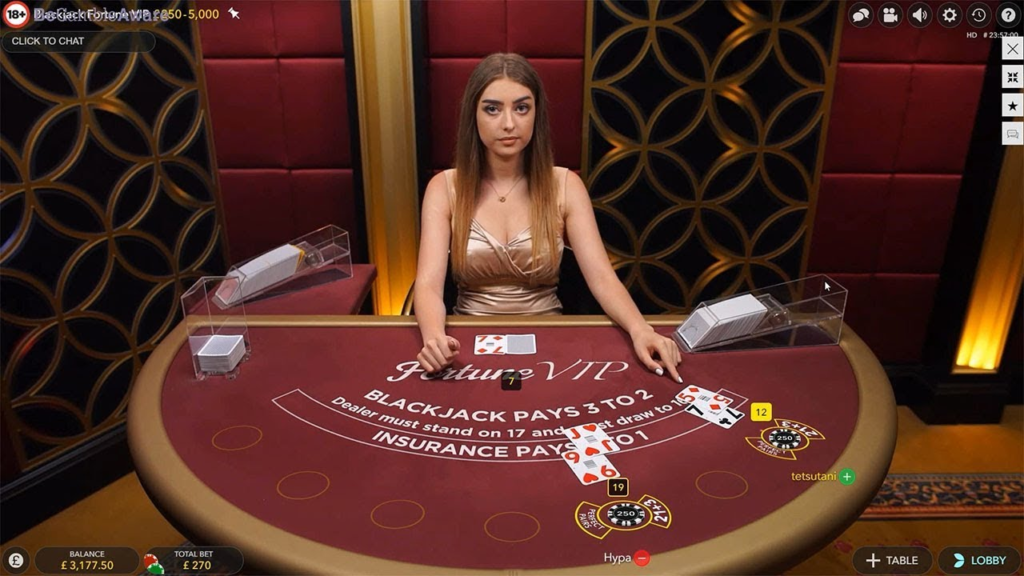 Fortune VIP live blackjack dealer at casino table.